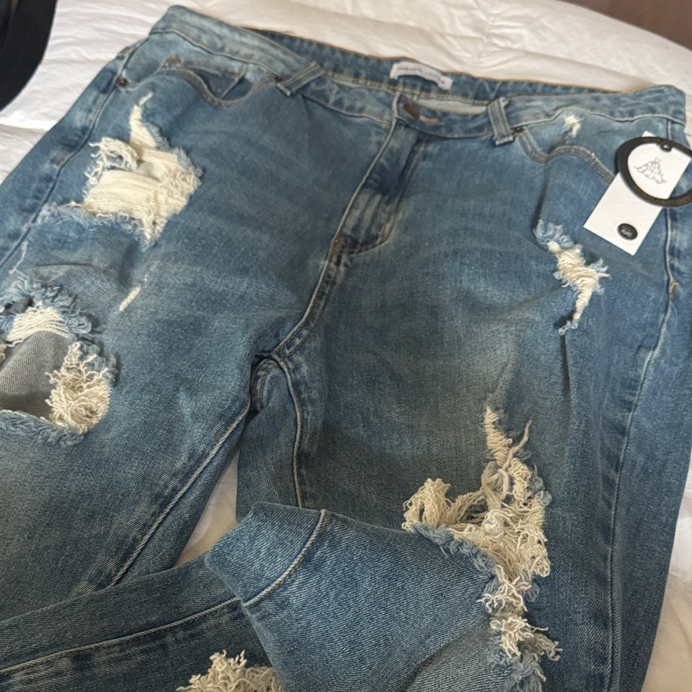 Indigo stitch Distressed Blue Jeans